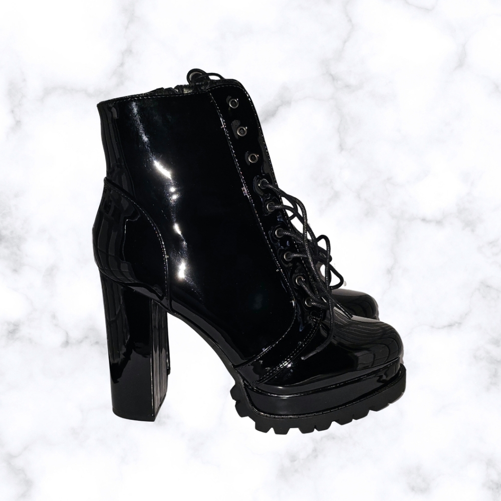 Black Combat Boots with High-Top Design and Thick Treaded Soles